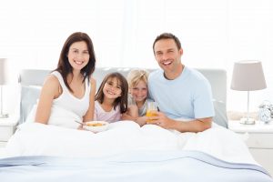 happy family having breakfast together bed happy-family-having-breakfast-together-bed