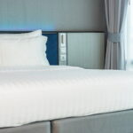 beautiful luxury comfortable white pillow blanket decoration interior bedroom 1 Mattress Care Myths Full vs Queen Mattress Mattress Care Myths: Things You Don’t Need to Do Anymore